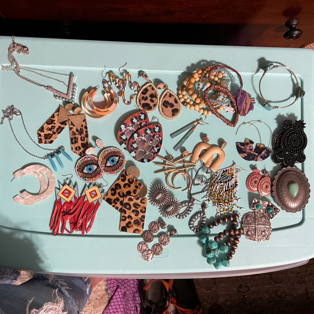 Lot of western style earrings, necklaces, and apple watch cowhide band